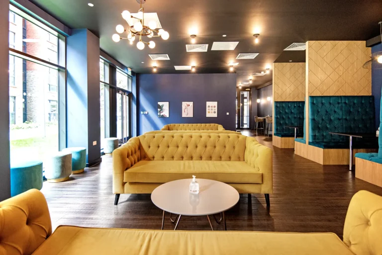 Howard Gardens communal space. It's a large room with sofas and seating booths.